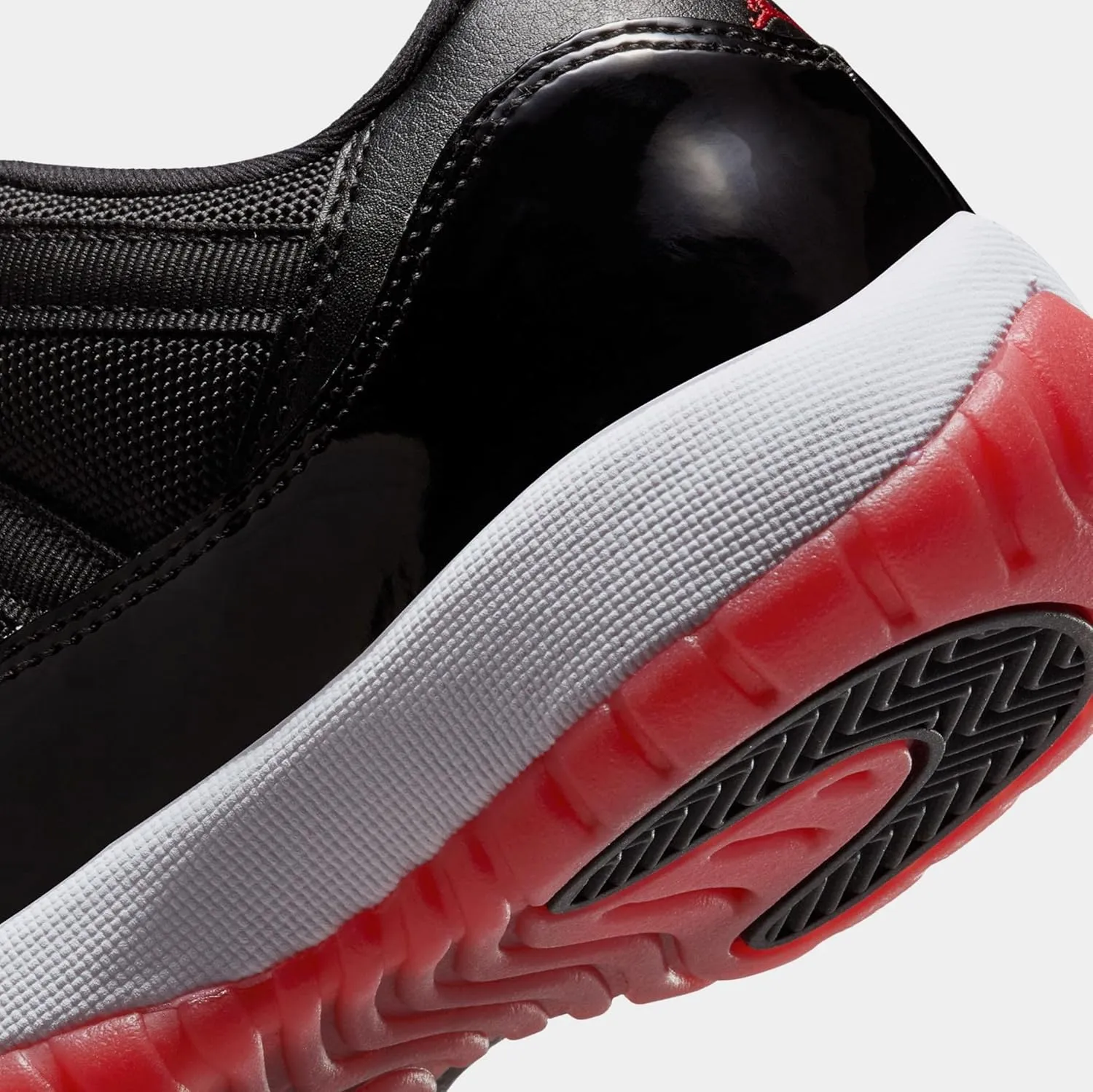 Air Jordan 11 Retro Low Bred Grade School Lifestyle Shoes (Black/Red/White)